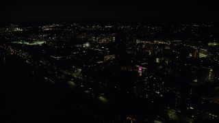 AX141_157 - 5.5K aerial stock footage flying by campus buildings, Massachusetts Institute of Technology, Cambridge, Massachusetts, night