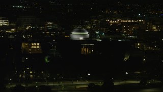 AX141_160 - 5.5K aerial stock footage of Maclaurin Building, Massachusetts Institute of Technology, Cambridge, Massachusetts, night