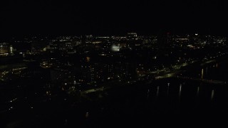 AX141_163 - 5.5K aerial stock footage approaching Maclaurin Building, Massachusetts Institute of Technology, Cambridge, Massachusetts, night