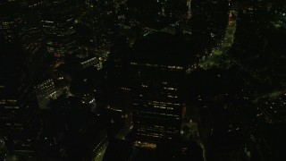 AX141_215 - 5.5K aerial stock footage approaching One Beacon Street, tilt down, Downtown Boston, Massachusetts, night