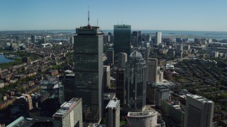 AX142_020 - 5.5K aerial stock footage flying by Prudential Tower, 111 Huntington Avenue, Downtown Boston, Massachusetts