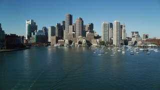 AX142_036 - 5.5K stock footage aerial video flying low approaching Rowes Wharf, Downtown Boston, Massachusetts