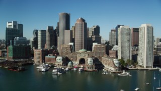 AX142_037 - 5.5K aerial stock footage of Rowes Wharf,  One and Two International Place, Downtown Boston, Massachusetts