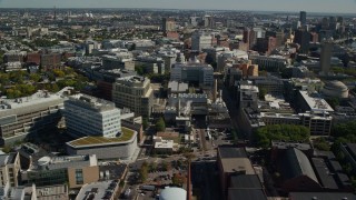 AX142_045 - 5.5K aerial stock footage flying by Massachusetts Institute of Technology (MIT), Cambridge, Massachusetts