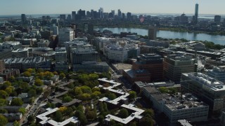 AX142_047 - 5.5K stock footage aerial video of office buildings, Main Street, Downtown Boston skyline, Cambridge, Massachusetts