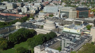 AX142_055 - 5.5K stock footage aerial video flying by Massachusetts Institute of Technology, Cambridge, Massachusetts