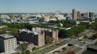 AX142_060 - 5.5K aerial stock footage approaching, flying over Massachusetts Institute of Technology, Cambridge, Massachusetts