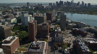AX142_062E - 5.5K aerial stock footage of Massachusetts Institute of Technology, Downtown Boston, Cambridge, Massachusetts