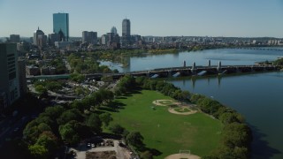AX142_067 - 5.5K aerial stock footage flying by Lederman Park, Longfellow Bridge, Downtown Boston, Massachusetts