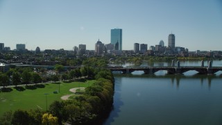 AX142_068 - 5.5K aerial stock footage flying by Lederman Park, Longfellow Bridge, Downtown Boston, Massachusetts