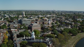 AX142_081 - 5.5K stock footage aerial video flying by Harvard University, Cambridge, Massachusetts