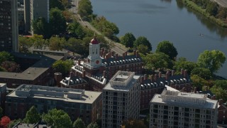 AX142_090E - 5.5K aerial stock footage flying by Harvard University, Dunster House, Cambridge, Massachusetts