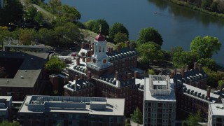 AX142_091 - 5.5K aerial stock footage flying by Harvard University, Dunster House, Cambridge, Massachusetts