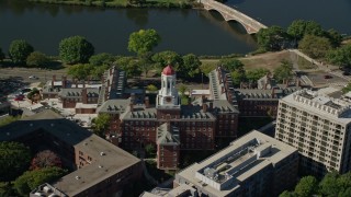 AX142_092E - 5.5K aerial stock footage orbiting Harvard University, Dunster House, Cambridge, Massachusetts