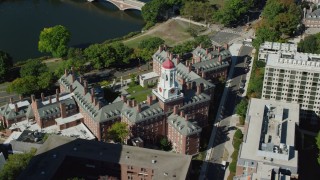 AX142_093 - 5.5K stock footage aerial video orbiting Harvard University, Dunster House, Cambridge, Massachusetts