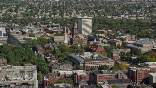 AX142_101E - 5.5K aerial stock footage flying by Harvard University, Widener Library, and Memorial Church in Cambridge, Massachusetts
