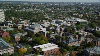 AX142_123 - 5.5K aerial stock footage flying over the Harvard University campus, Cambridge, Massachusetts