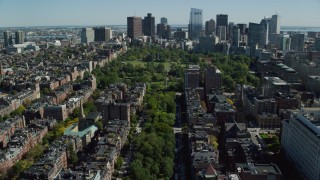 AX142_165 - 5.5K aerial stock footage of Victorian brownstones, Boston Common, Back Bay, Downtown Boston, Massachusetts