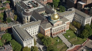 AX142_167 - 5.5K aerial stock footage approaching the Massachusetts State House, Downtown Boston, Massachusetts