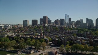 AX142_173E - 5.5K aerial stock footage approaching buildings and parks, Beacon Hill, Downtown Boston, Massachusetts