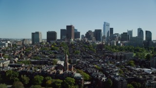 AX142_174 - 5.5K stock footage aerial video flying over parks, approaching Beacon Hill, Downtown Boston, Massachusetts