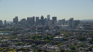 AX142_180E - 5.5K aerial stock footage of Bunker Hill Monument, Downtown Boston skyline, Charlestown, Massachusetts