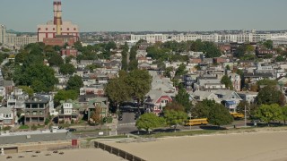 AX142_211 - 5.5K aerial stock footage flying by beachfront homes, South Boston, Massachusetts