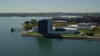 AX142_216E - 5.5K aerial stock footage approaching the John F. Kennedy Presidential Library, Boston, Massachusetts