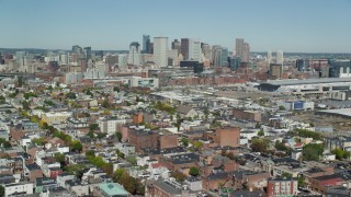AX142_228 - 5.5K aerial stock footage flying over neighborhoods, approaching Downtown, South Boston, Massachusetts