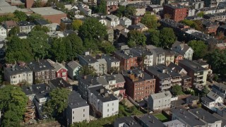 AX142_232 - 5.5K aerial stock footage flying by residential neighborhoods, South Boston, Massachusetts