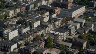 AX142_233 - 5.5K stock footage aerial video flying by residential neighborhoods, tilt down, South Boston, Massachusetts