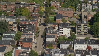 AX142_234 - 5.5K aerial stock footage flying by apartment buildings, quiet streets, South Boston, Massachusetts