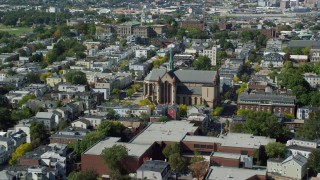 AX142_239 - 5.5K aerial stock footage approaching Gate of Heaven Catholic Church, South Boston, Massachusetts