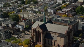 AX142_239E - 5.5K aerial stock footage approaching Gate of Heaven Catholic Church, South Boston, Massachusetts