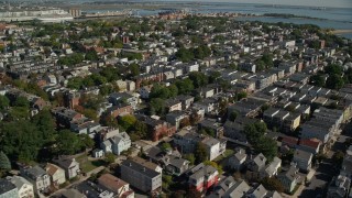 AX142_243E - 5.5K aerial stock footage flying by coastal communities, South Boston, Massachusetts