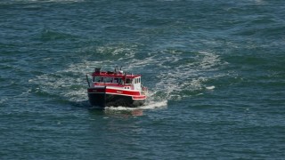 AX142_271 - 5.5K aerial stock footage tracking a lobster fishing boat, Boston Harbor, Massachusetts