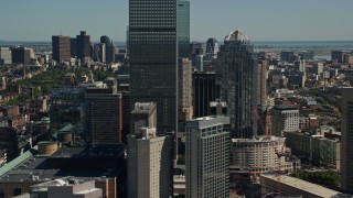 AX142_308 - 5.5K aerial stock footage flying by Prudential Tower, 111 Huntington Avenue, Downtown Boston, Massachusetts