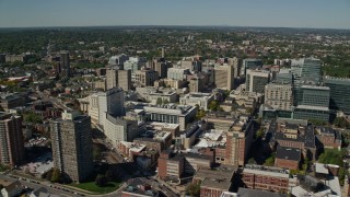 AX142_309 - 5.5K aerial stock footage flying by the Longwood Medical Area, Boston, Massachusetts