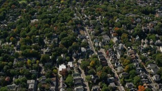 AX142_311E - 5.5K aerial stock footage flying over suburban residential neighborhood, Jamaica Plain, Massachusetts