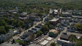 AX143_088 - 5.5K aerial stock footage flying over small coastal community, Plymouth, Massachusetts