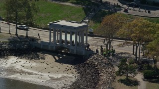 AX143_090 - 5.5K aerial stock footage flying by Plymouth Rock, Plymouth, Massachusetts