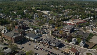 AX143_091E - 5.5K aerial stock footage flying by small coastal town, Plymouth, Massachusetts