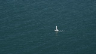 AX143_126 - 5.5K aerial stock footage tracking sailing boat on Cape Cod Bay, Massachusetts
