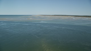 AX143_146 - 5.5K aerial stock footage approaching sand bars, low tide, Cape Cod Bay, Massachusetts