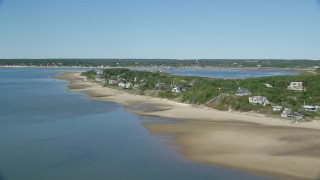 AX143_193 - 5.5K aerial stock footage flying over Chipman's Cove, approach beachfront homes, Wellfleet, Massachusetts