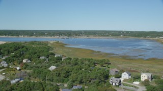 AX143_194 - 5.5K aerial stock footage flying over beachfront homes, approach Chipman's Cove, Wellfleet, Massachusetts