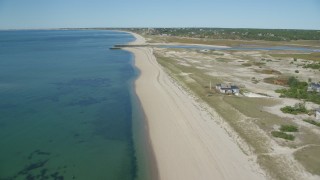 AX143_204 - 5.5K aerial stock footage flying over beach, approaching inlet, Cape Cod, Truro, Massachusetts