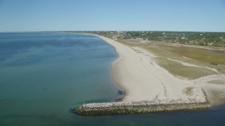 AX143_205 - 5.5K aerial stock footage flying over beach, inlet, Cape Cod, Truro, Massachusetts