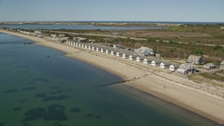 AX143_214 - 5.5K aerial stock footage flying by Top Mast Resort, Days' Cottages, Cape Cod, Truro, Massachusetts
