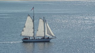 AX143_243 - 5.5K aerial stock footage tracking sailing boat on Cape Cod Bay, Massachusetts